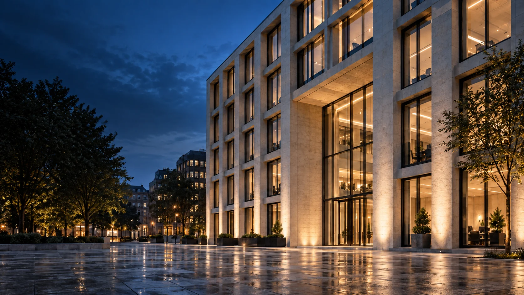 Contemporary stone and glass building at blue hour